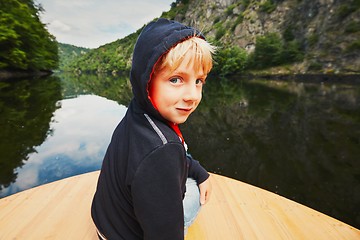 Image showing Little traveler on the boat