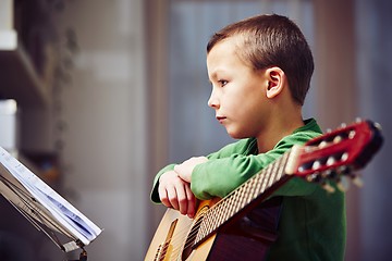 Image showing Little guitarist