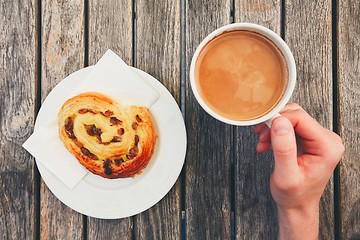 Image showing Morning coffee with with sweet pastries