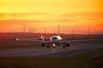 Image showing Airport traffic at the sunset