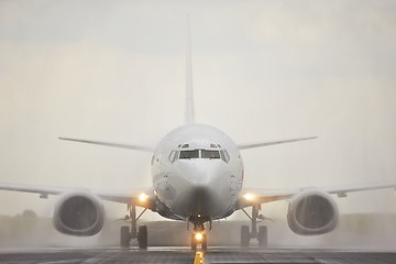 Image showing Landing in rain