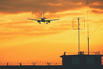 Image showing Airplane at the sunset