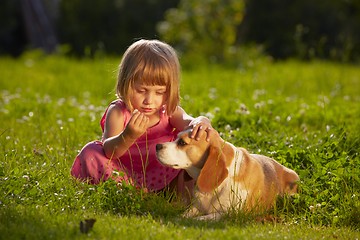 Image showing Girl with dog