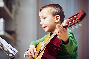 Image showing Little guitarist