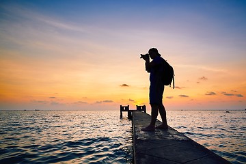 Image showing Photographer at the sunset