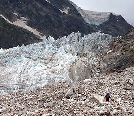 Image showing Glacier and hiker on moraine