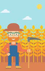 Image showing Farmer on the field with scythe.