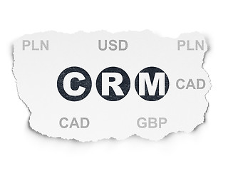 Image showing Business concept: CRM on Torn Paper background