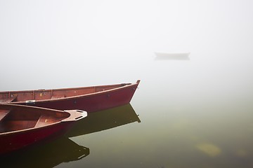 Image showing Boats in mysterious fog