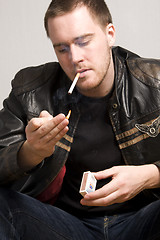 Image showing man smoking a cigarette