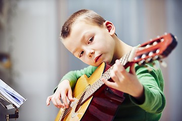 Image showing Little guitarist