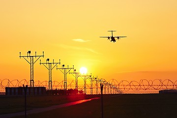 Image showing Airplane at the sunset 