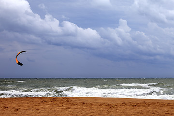 Image showing Power kite in sea and cloudy sky