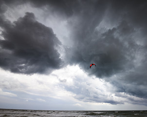 Image showing Power kite in sea and storm sky