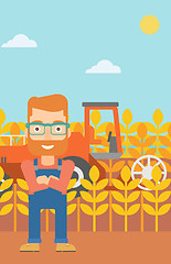 Image showing Man standing with combine on background.