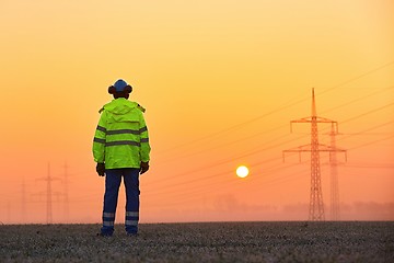 Image showing Worker at the sunrise