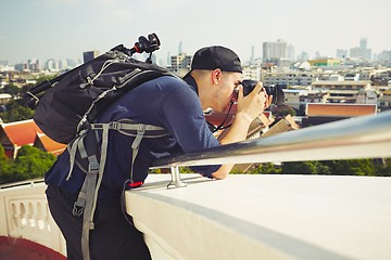 Image showing Photographer taking photos