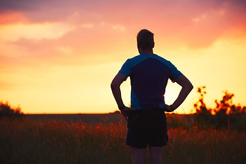 Image showing Pensive runner at the sunset