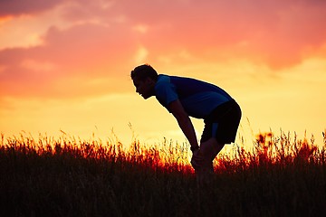 Image showing Runner at the sunset