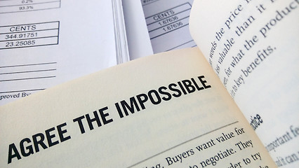 Image showing Agree the impossible word on the book 