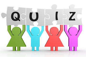 Image showing Four people hold puzzle with quiz word