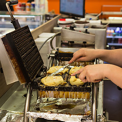 Image showing Preparing homemade Belgian waffles.
