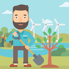 Image showing Man plants tree.