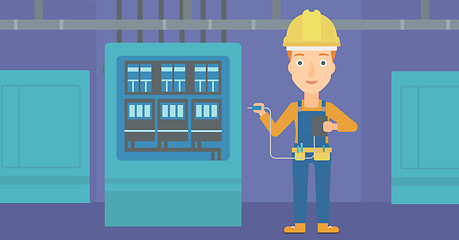 Image showing Electrician with electrical equipment.