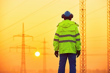 Image showing Worker at the sunrise