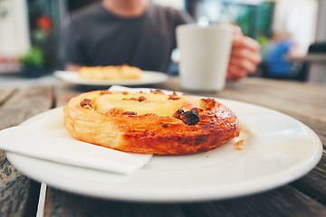 Image showing Morning coffee with with sweet pastries