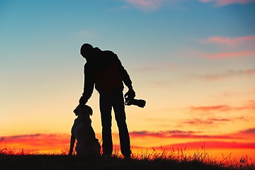 Image showing Photographer with dog