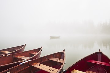 Image showing Boats in mysterious fog