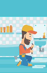 Image showing Man repairing sink.