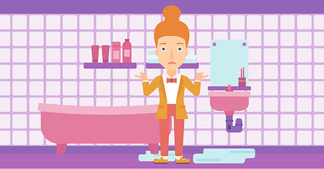 Image showing Woman in despair standing near leaking sink.