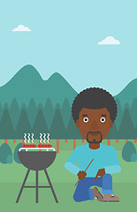 Image showing Man preparing barbecue.