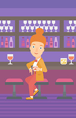 Image showing Woman sitting at bar.