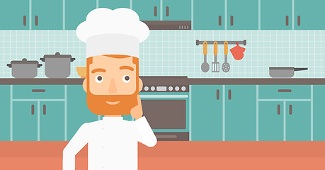 Image showing Chef pointing forefinger up.