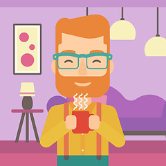 Image showing Man holding cup of coffee.