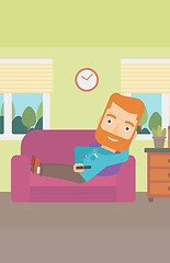 Image showing Man lying on sofa.