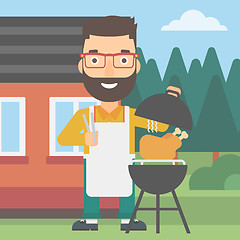 Image showing Man preparing barbecue.