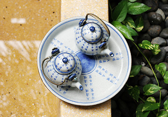 Image showing Asian pottery tea set.