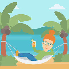 Image showing Woman chilling in hammock.