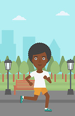 Image showing Sportive woman jogging.