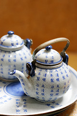 Image showing Asian pottery tea set.