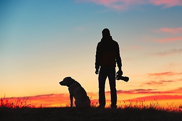 Image showing Photographer with dog