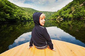 Image showing Little traveler on the boat