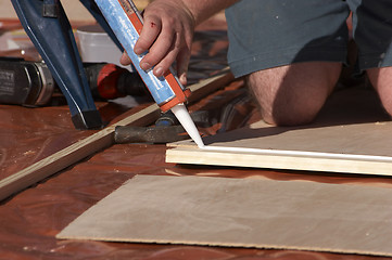 Image showing Glue Gun and Wood