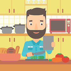 Image showing Man cooking meal.