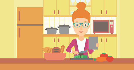 Image showing Woman cooking meal.