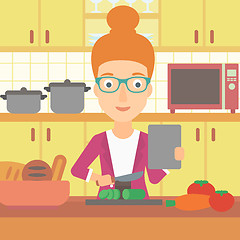 Image showing Woman cooking meal.